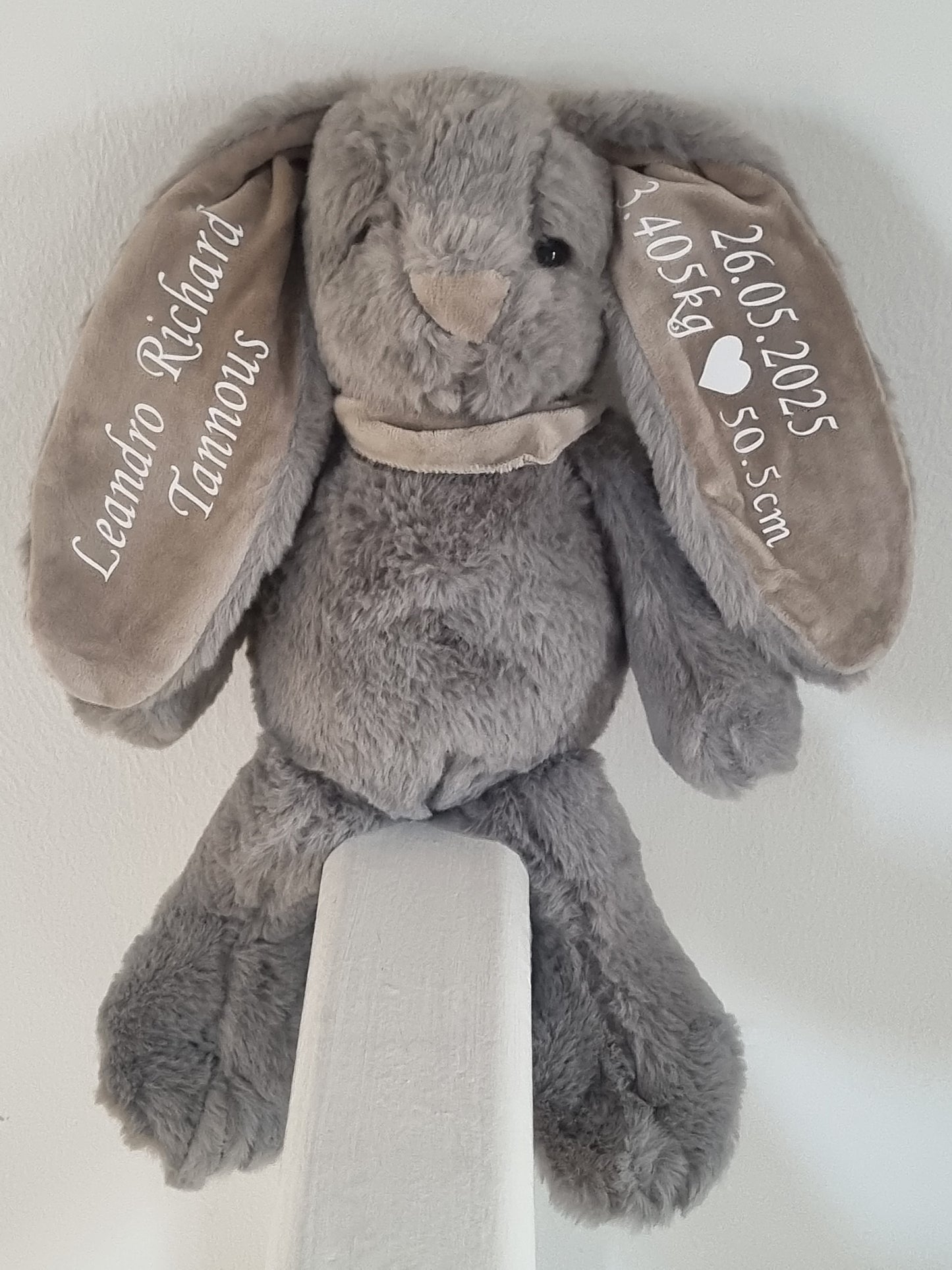 Plush bunny with birth details